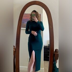 Long green turtleneck thermal dress with a slit